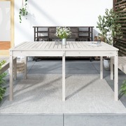 Ivory Purity Meets Nature: White Pine Wood Garden Table for Outdoor Elegance